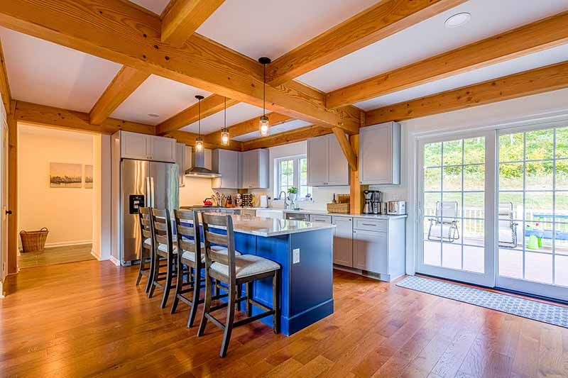 Timber frame home in new jersey with gray cabinets