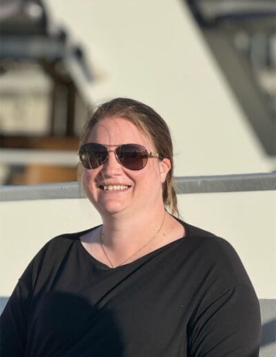 Woman smiling with sunglasses