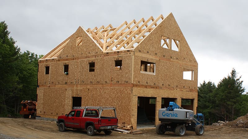 Exterior view of Modern Prefab Home, a panelized home in Massachusetts with beautiful wood siding.